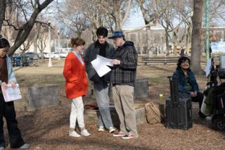 The director going through the pages with the two leads, the script supervisor waiting with her own copy