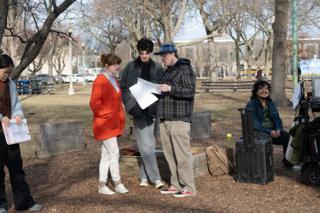 The director going through the pages with the two leads, the script supervisor waiting with her own copy